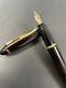 A Good Aurora Ipsilon Fountain Pen. Black Lacquer And Gold Trim. 14k Gold Nib