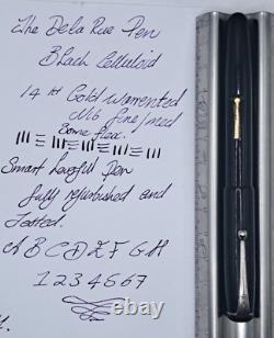 Le stylo Onoto De La Rue noir avec pointe en or 14 carats