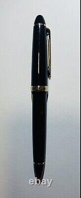 Marin 1911S Noir/Or avec garniture 14k et plume moyenne souple, cartouche et pochette.