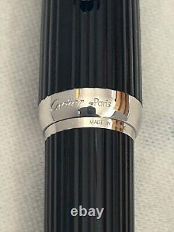 Stylo-plume Cartier en composite noir avec plume en or 18 carats - Excellent état