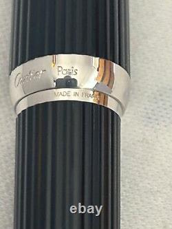 Stylo-plume Cartier en composite noir avec plume en or 18 carats - Excellent état