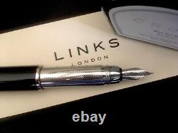 Stylo-plume inverse noir/argent neuf de Links Of London avec encre.