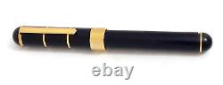 Stylo plume oversize en laque noire avec bagues dorées Yves Saint Laurent